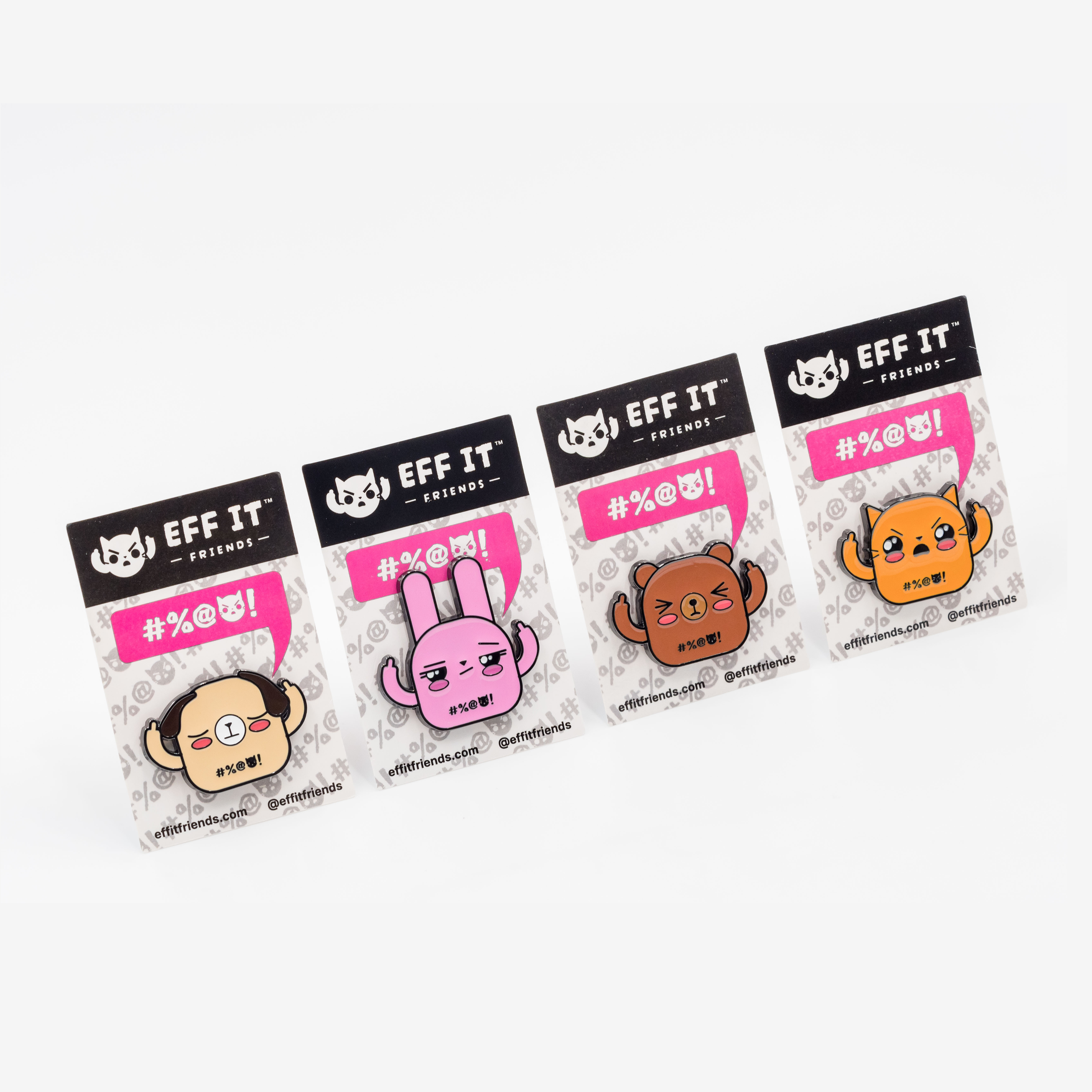 Beige dog enamel pin, pink bunny enamel pin, brown bear enamel pin, orange cat enamel pin, on branded packaging card