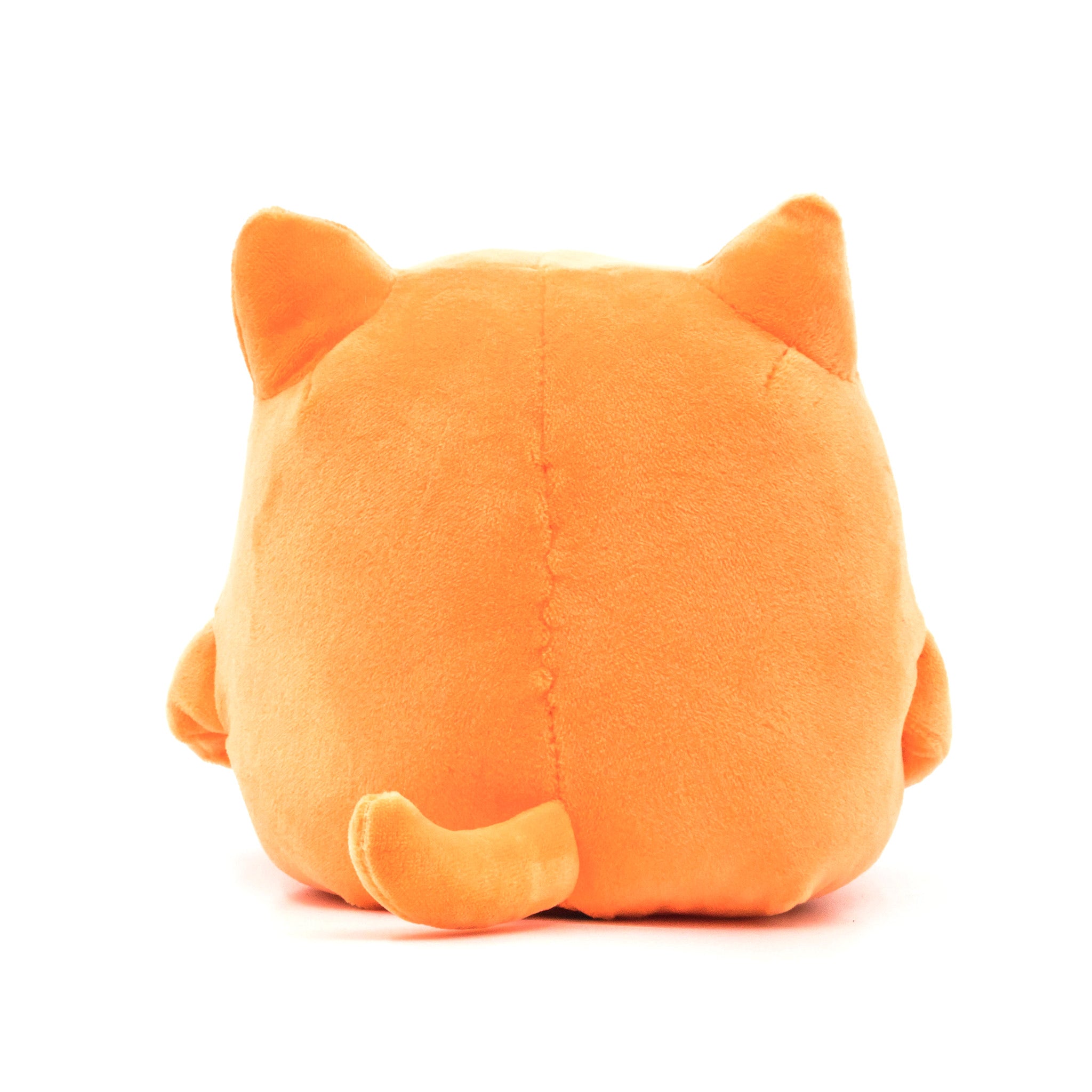 Orange cat plush, standing up, hands in front pocket, rear view.