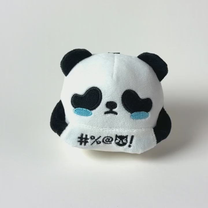 Winston keychain plush: the middle fingers come out of the front pocket, then tuck back in